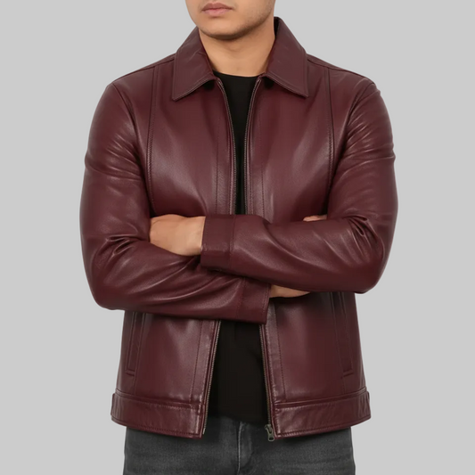 Man wearing a maroon leather jacket on a white background