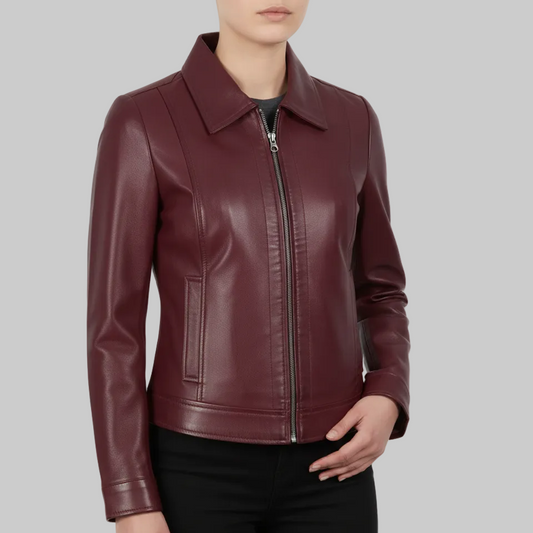 Burgundy leather jacket worn by a person on a white background