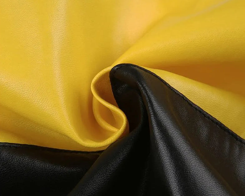 Close-up of yellow and black leather fabric