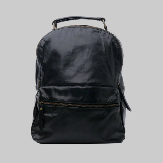 Black backpack on a white background