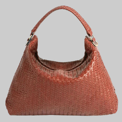 Brown woven handbag on a white background