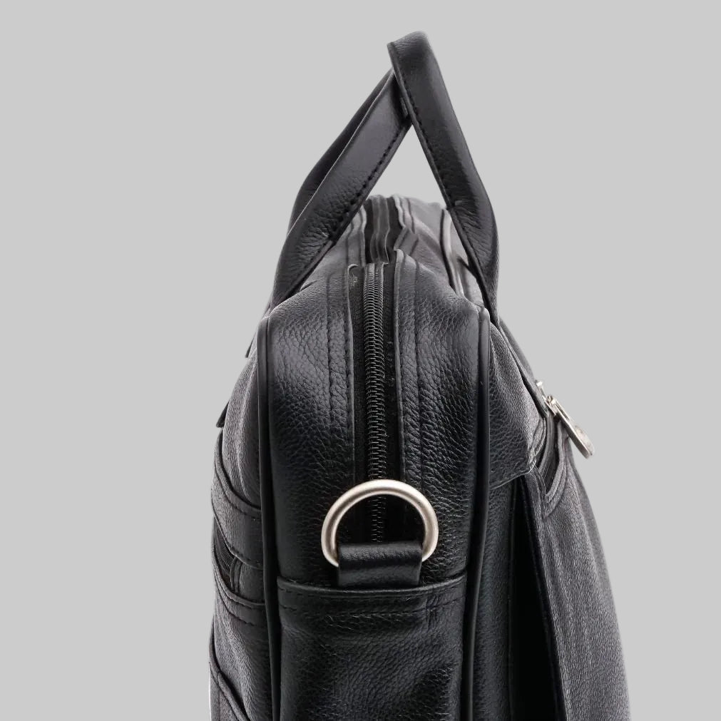 Black leather bag with a handle on a white background