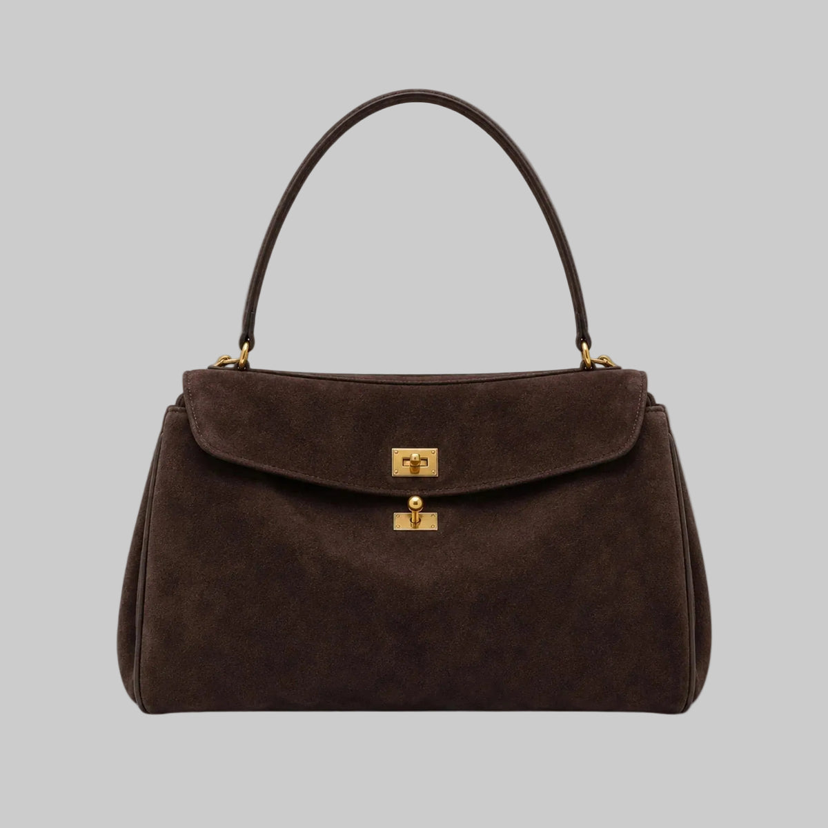 Brown handbag with a gold clasp on a white background