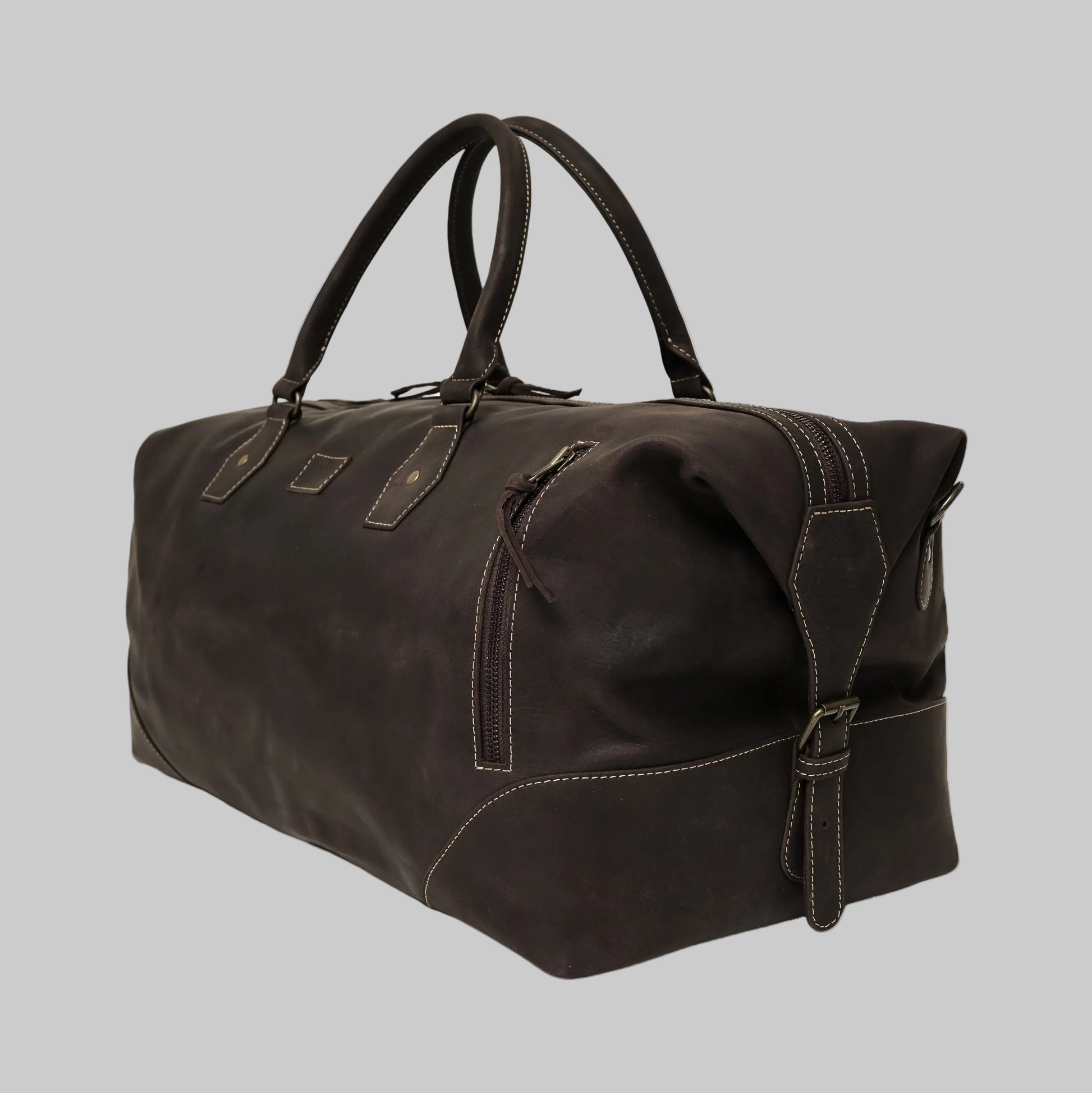 Brown leather duffel bag on a white background