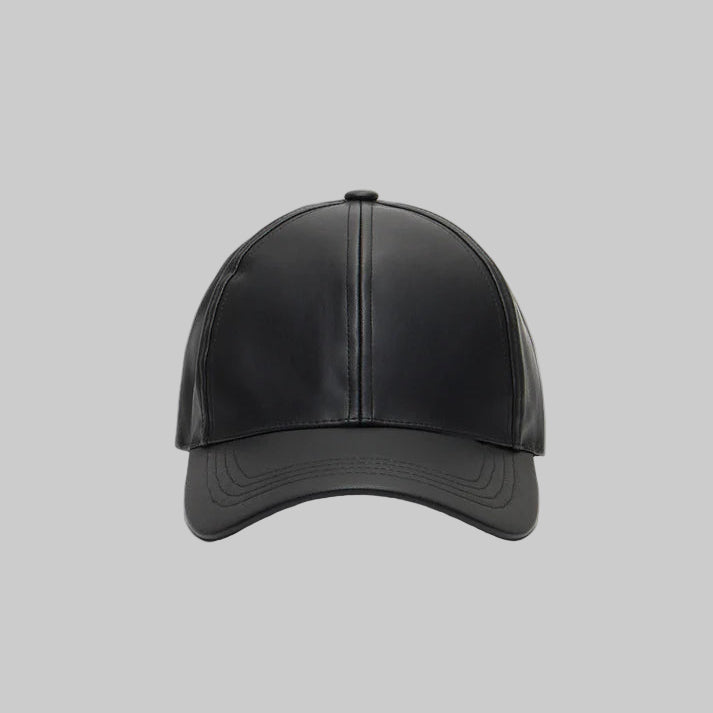 Black leather cap on a light gray background