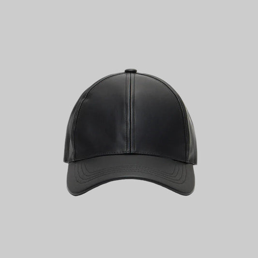 Black leather cap on a light gray background