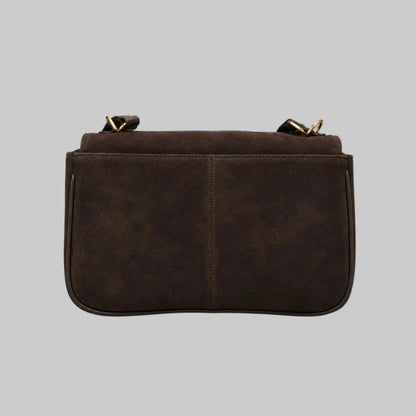 Brown leather handbag on a white background