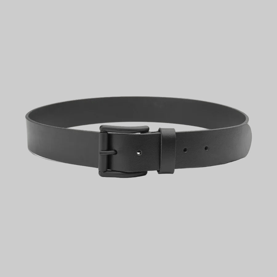 Black belt with a black buckle on a light gray background