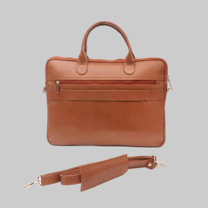 Brown leather briefcase with a detachable strap on a white background