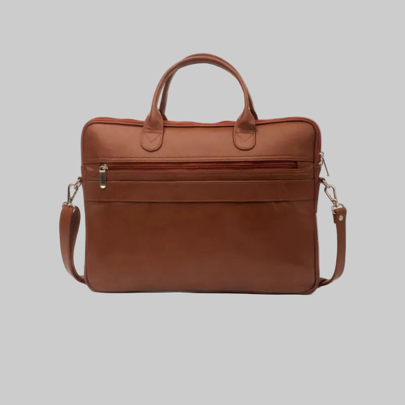 A brown leather briefcase with top handles and a detachable shoulder strap, photographed against a plain white background.