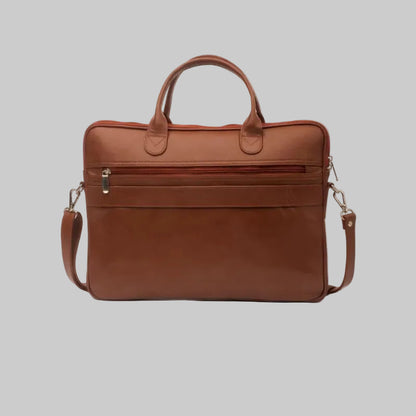 A brown leather briefcase with top handles and a detachable shoulder strap, photographed against a plain white background.