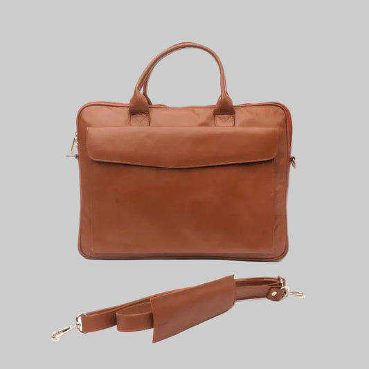 A brown leather briefcase with dual top handles and a detachable shoulder strap, displayed on a clean white background.