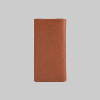 Brown leather wallet on a light gray background
