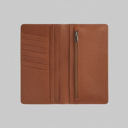 Brown leather wallet with zipper on a light gray background