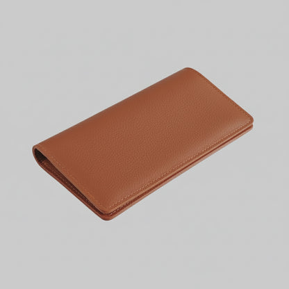 Brown leather wallet on a light gray background