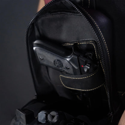 Black backpack with a gun inside on a dark background