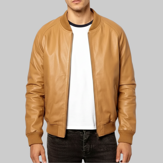 Tan leather jacket worn by a person on a white background