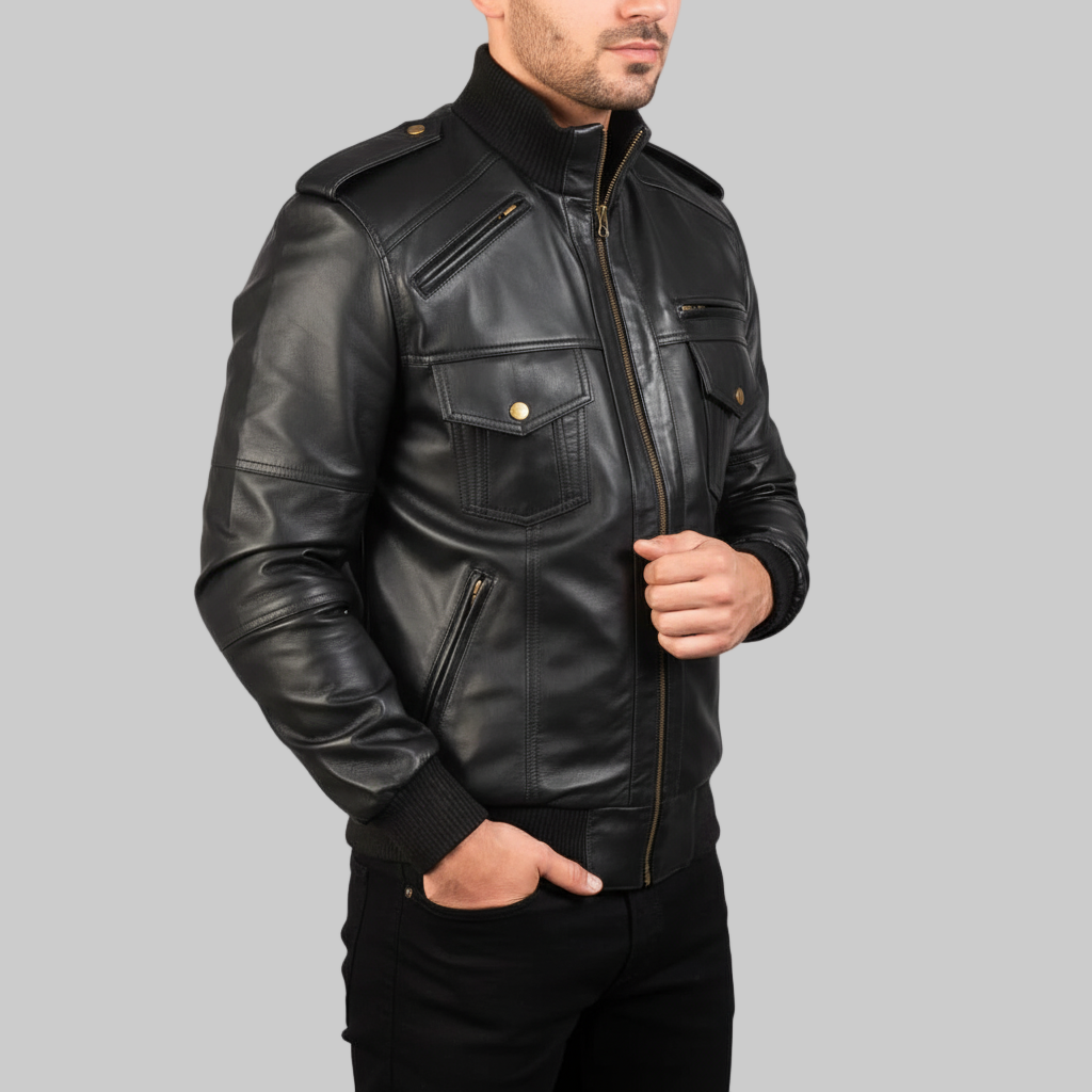 Man wearing a black leather jacket on a light gray background