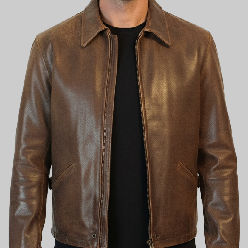 Brown leather jacket worn by a person on a white background