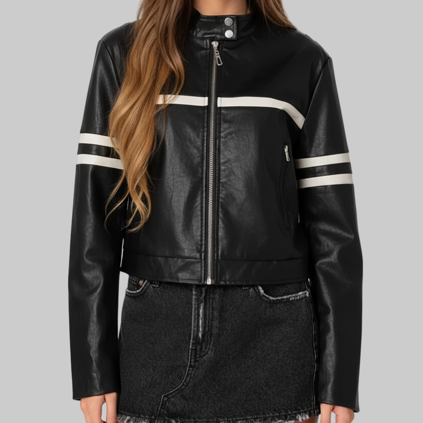 Woman wearing a black leather jacket with white stripes on a white background