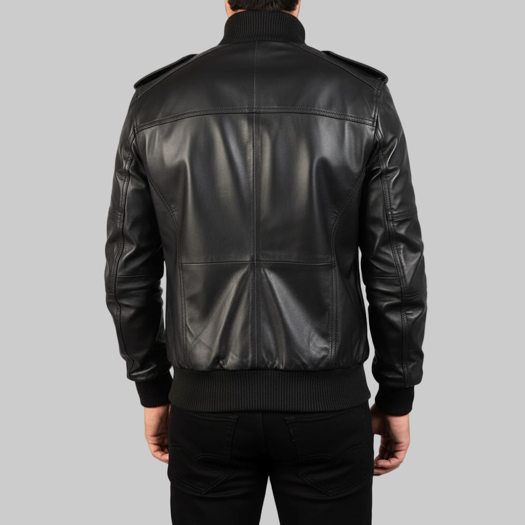 Black leather jacket worn by a person on a white background