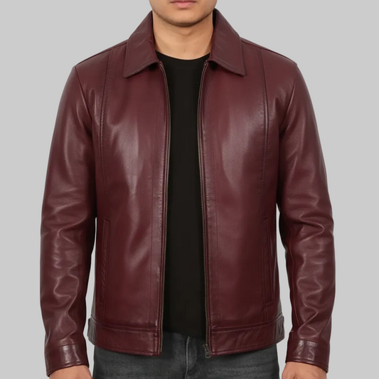Maroon leather jacket worn by a person on a white background