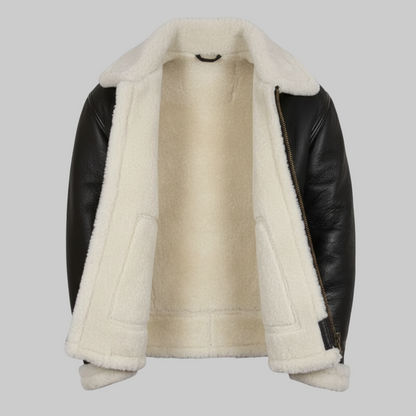 Shearling jacket with black leather sleeves on a white background