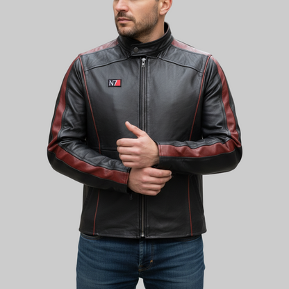 Man wearing a black and red leather jacket with a logo on a blurred street background