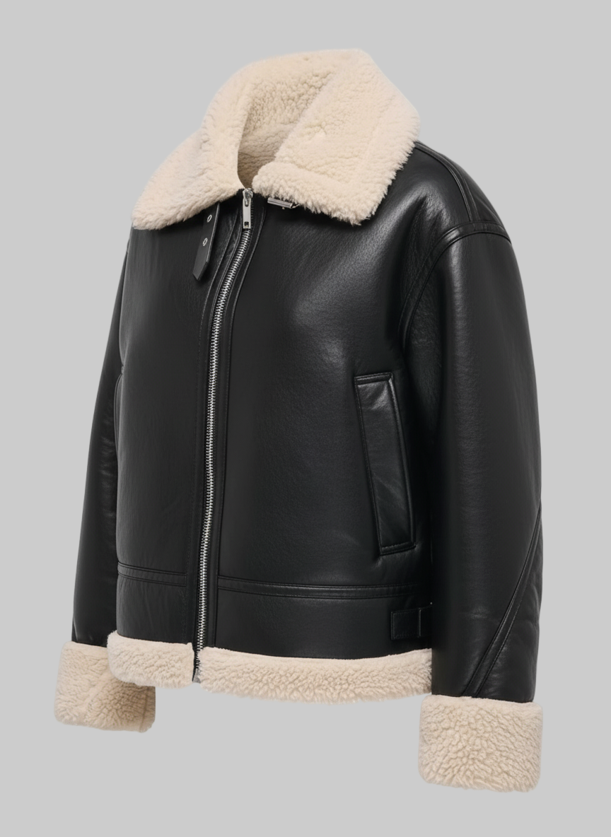 Black leather jacket with beige shearling collar and cuffs on a white background