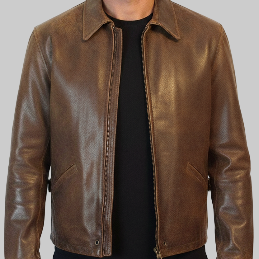 Brown leather jacket worn by a person on a white background