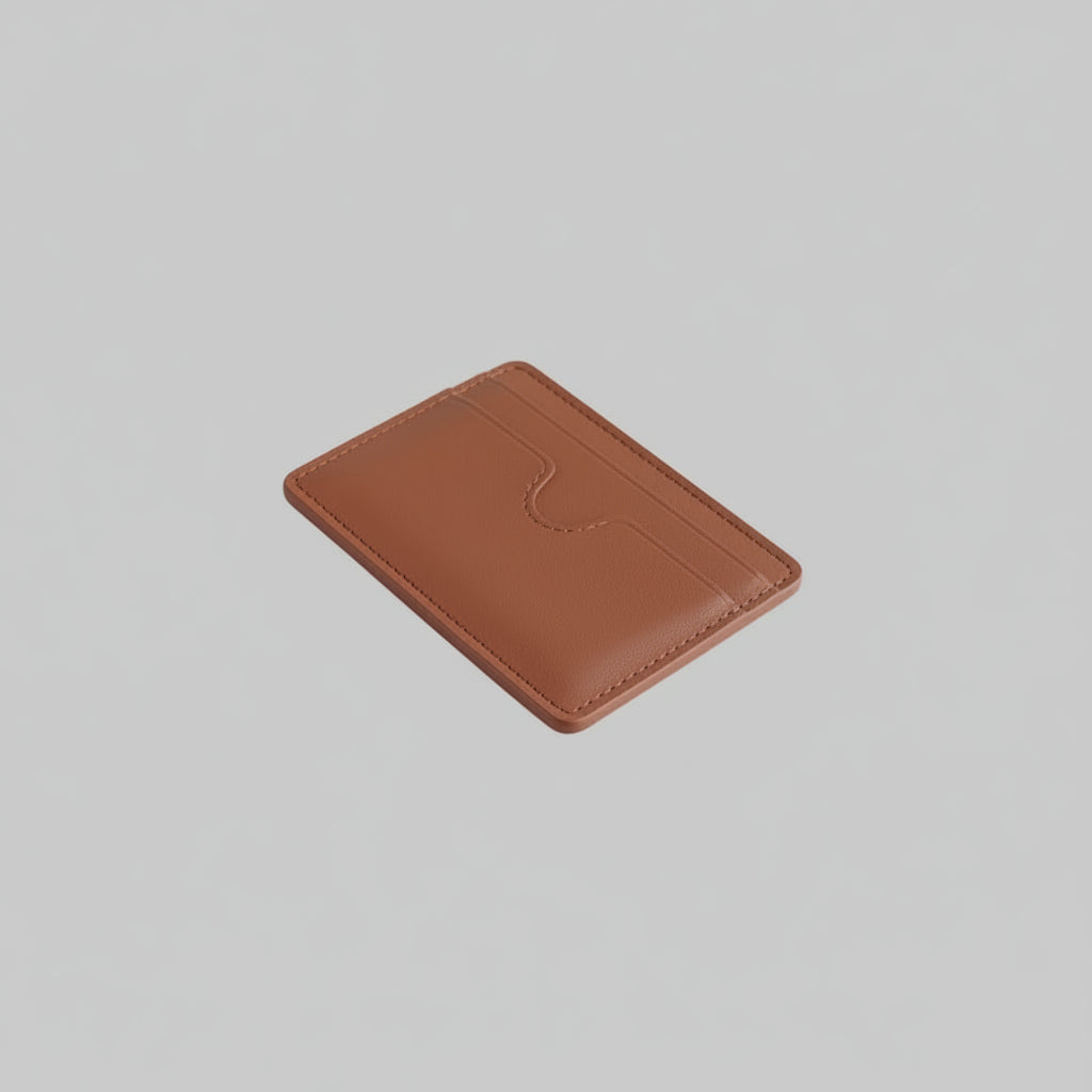 Brown leather cardholder on a light gray background