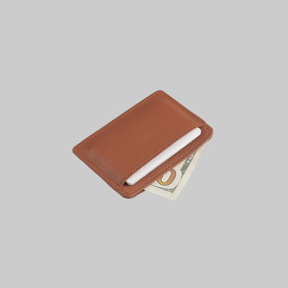 Brown leather wallet with a card and dollar bill on a light gray background