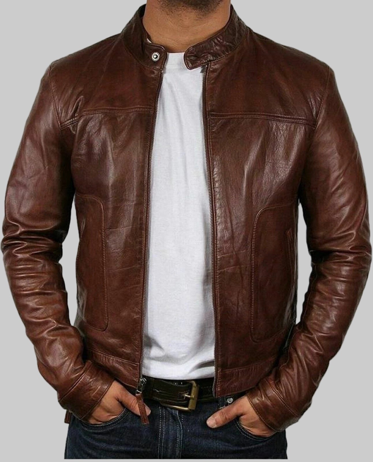 Brown leather jacket worn by a person on a white background