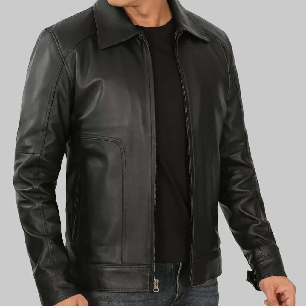 Black leather jacket worn by a person on a white background