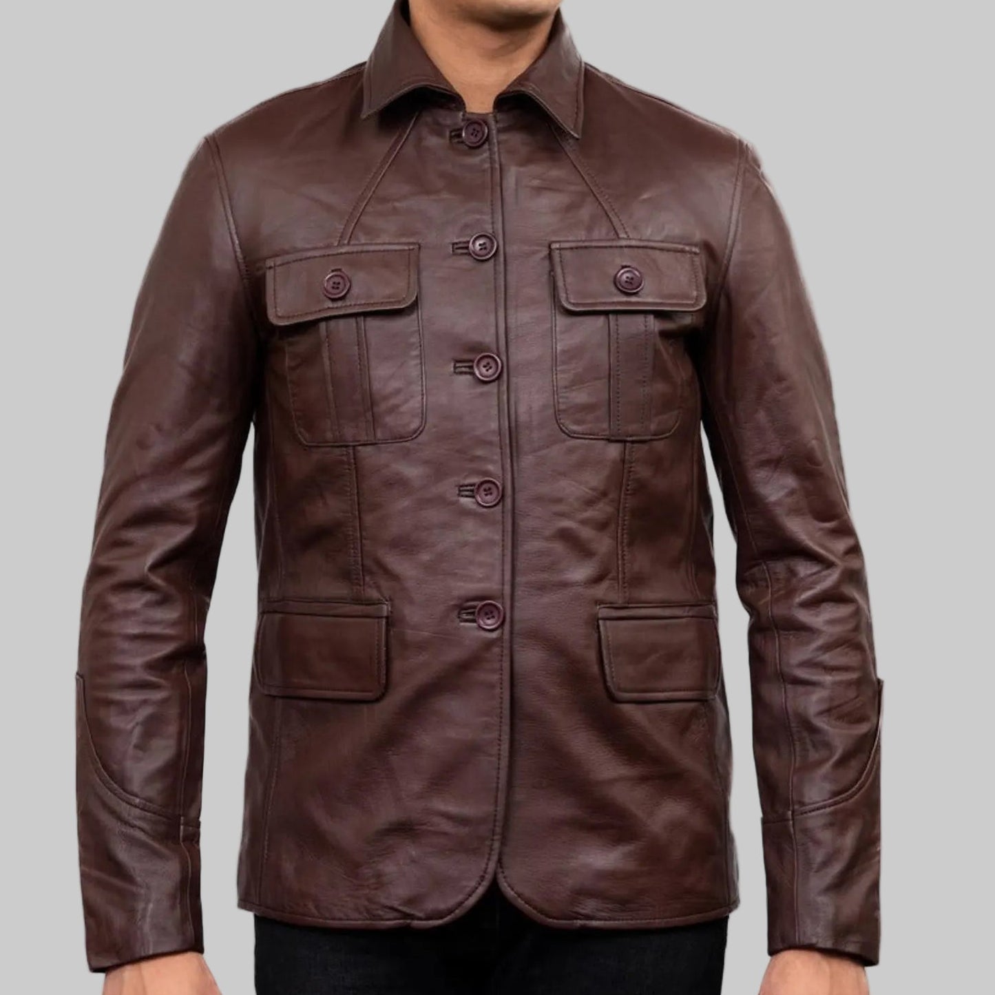Brown leather jacket on a white background