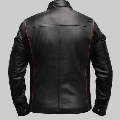 Black leather jacket with red stitching on a white background