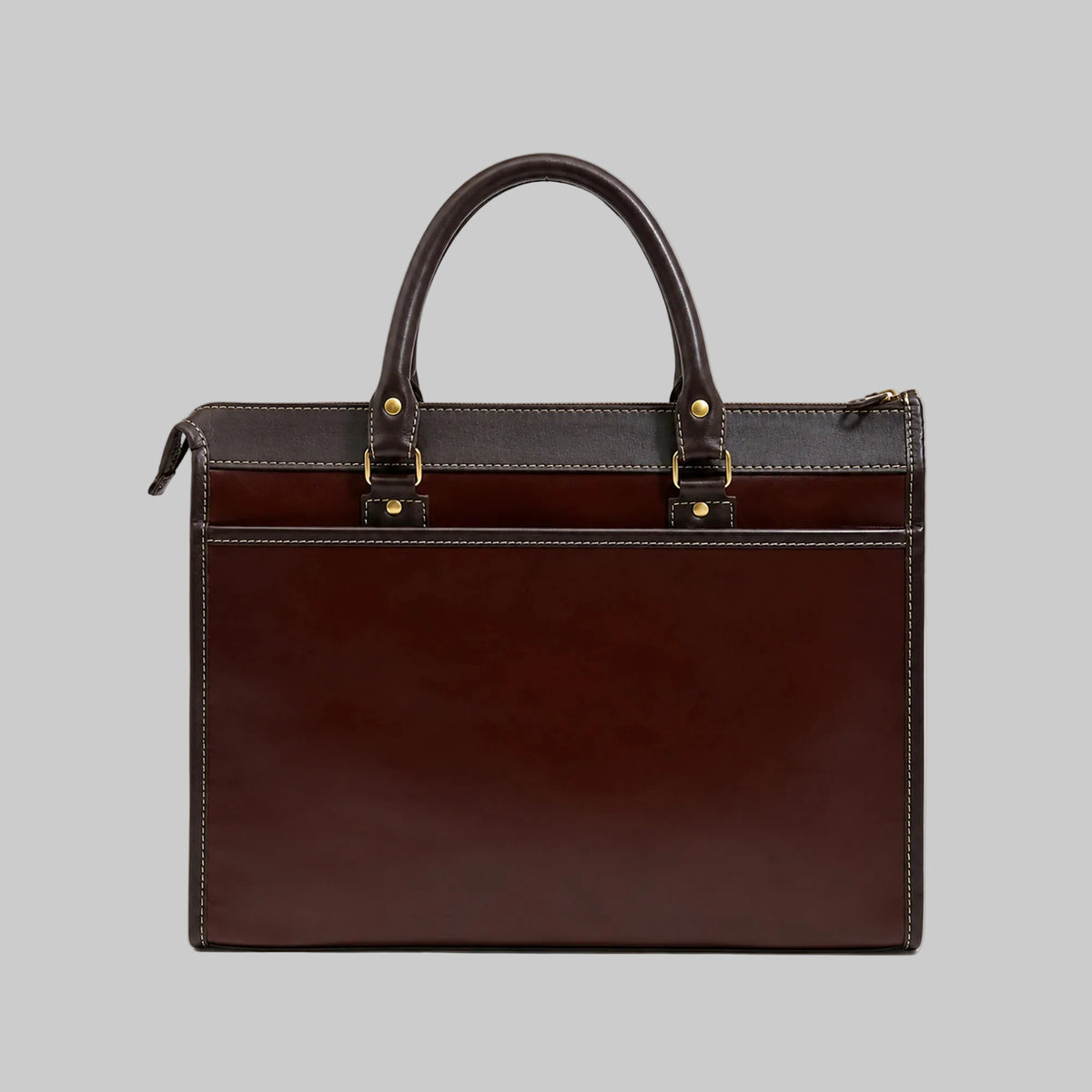 A dark brown leather briefcase with a glossy finish, featuring dual top handles, gold-tone hardware, and a zippered top closure, set against a plain white background.