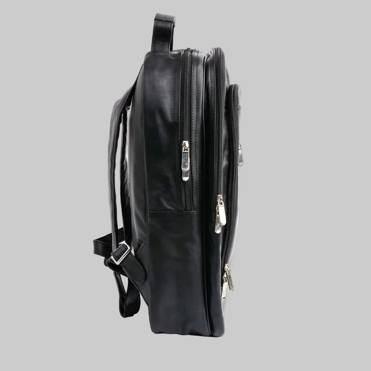 Black leather backpack with zippers on a white background