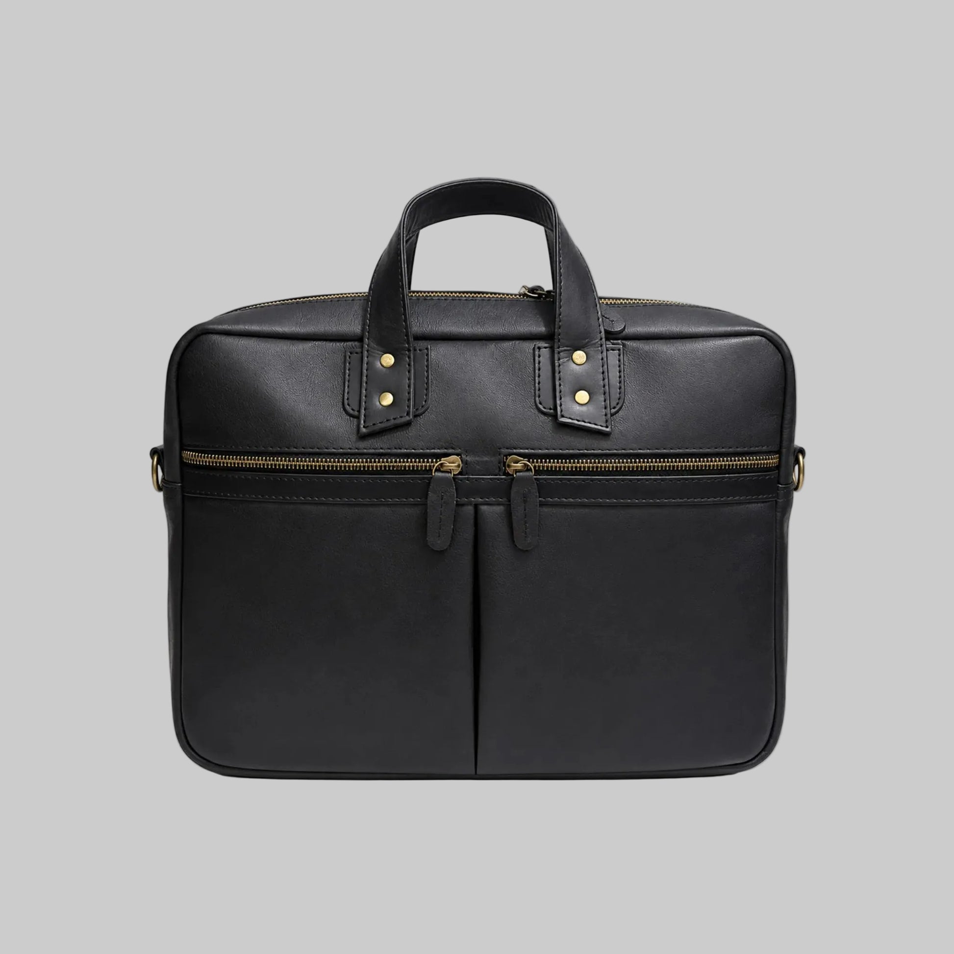 A black leather briefcase with dual top handles, gold-tone hardware, and a front zippered pocket, shown against a plain white background.