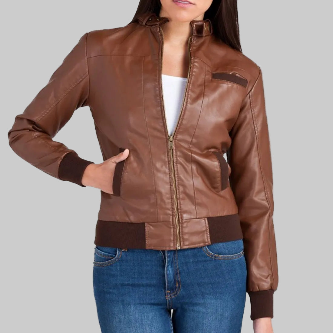 Brown leather jacket worn by a person on a white background