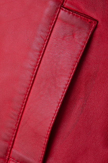 Close-up of a red leather jacket with stitching detail