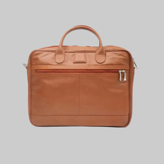 A brown leather briefcase with top handles, a front zippered pocket, and silver zipper pulls, photographed against a plain white background.