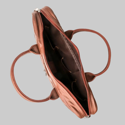 Brown leather handbag with open top on a white background