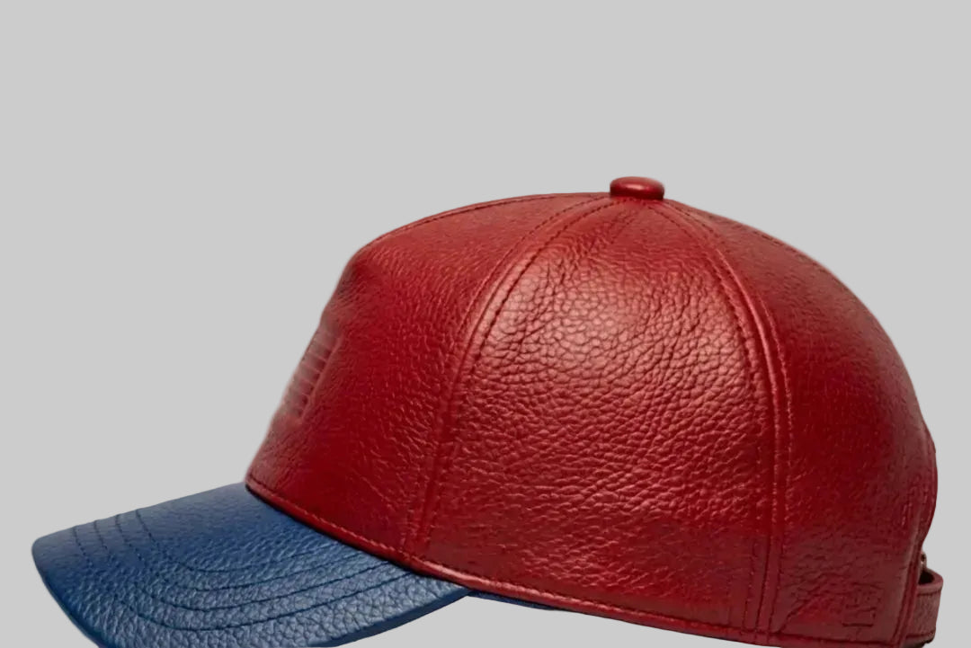 Red and blue leather cap on a light gray background