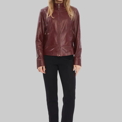 Woman wearing a brown leather jacket on a white background