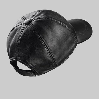 Black leather cap on a white background